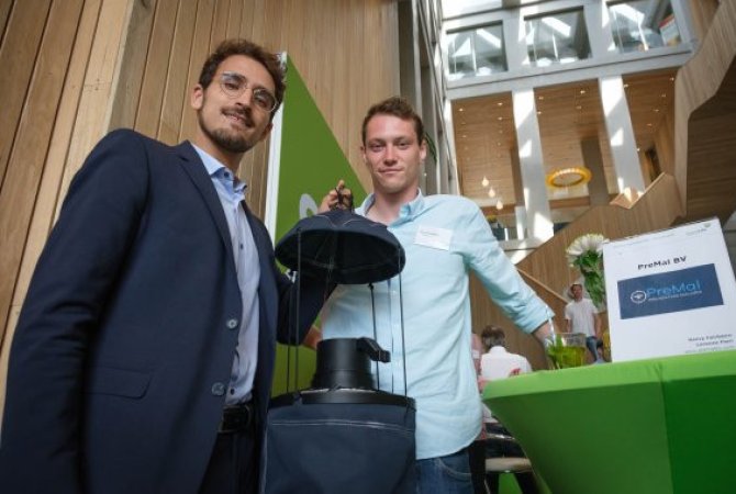 Researcher Florian Muijres and entrepreneur Henry Fairbairn with the MTego mosquito trap