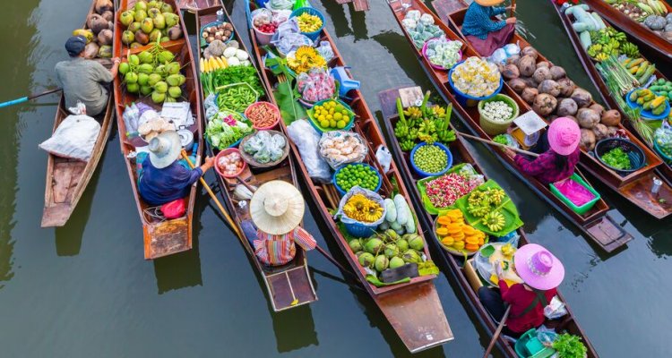 Floating traditional Thai food market on boats